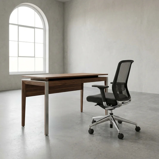 Minimalist B2B product photography of a modern writing desk and chair set in a clean studio environment, no text overlays.